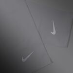 NIKE 輕量跑步臂套2.0 護臂套 袖套 路跑 戶外運動 素色 簡約 防曬 反光 吸濕 排汗 快乾 透氣 黑 白 亮綠, , large